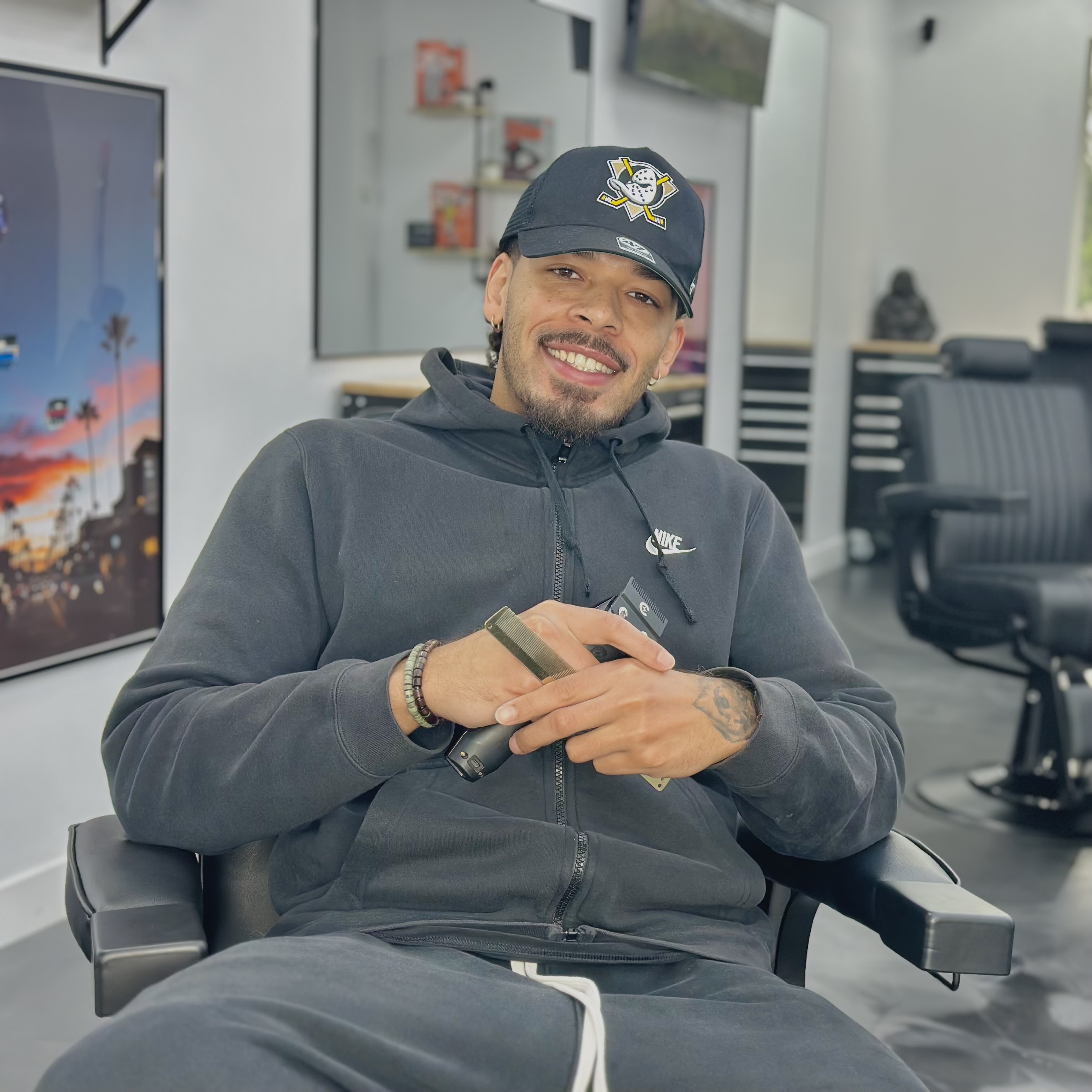 DaMarcus Campion, the barber and owner of Camp Cuts